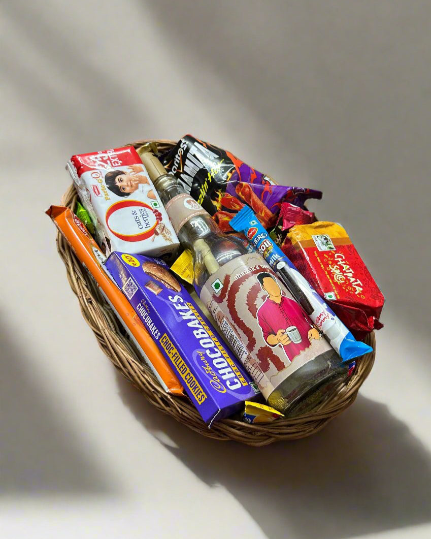 Elegant Gift Basket featuring a personalized DopaMean bottle with built-in light, assorted snacks, and a handcrafted cane basket, perfect for any special occasion.