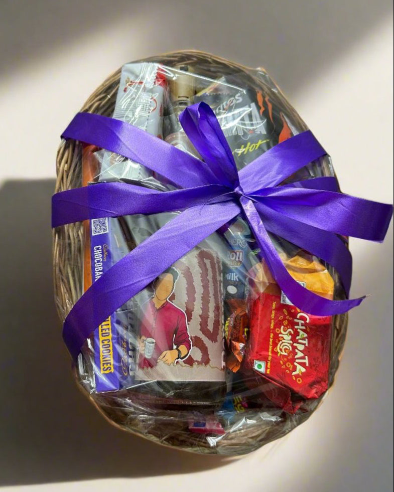 Handcrafted cane basket, elegantly designed to hold a DopaMean bottle and assorted snacks, offering a rustic and reusable packaging option