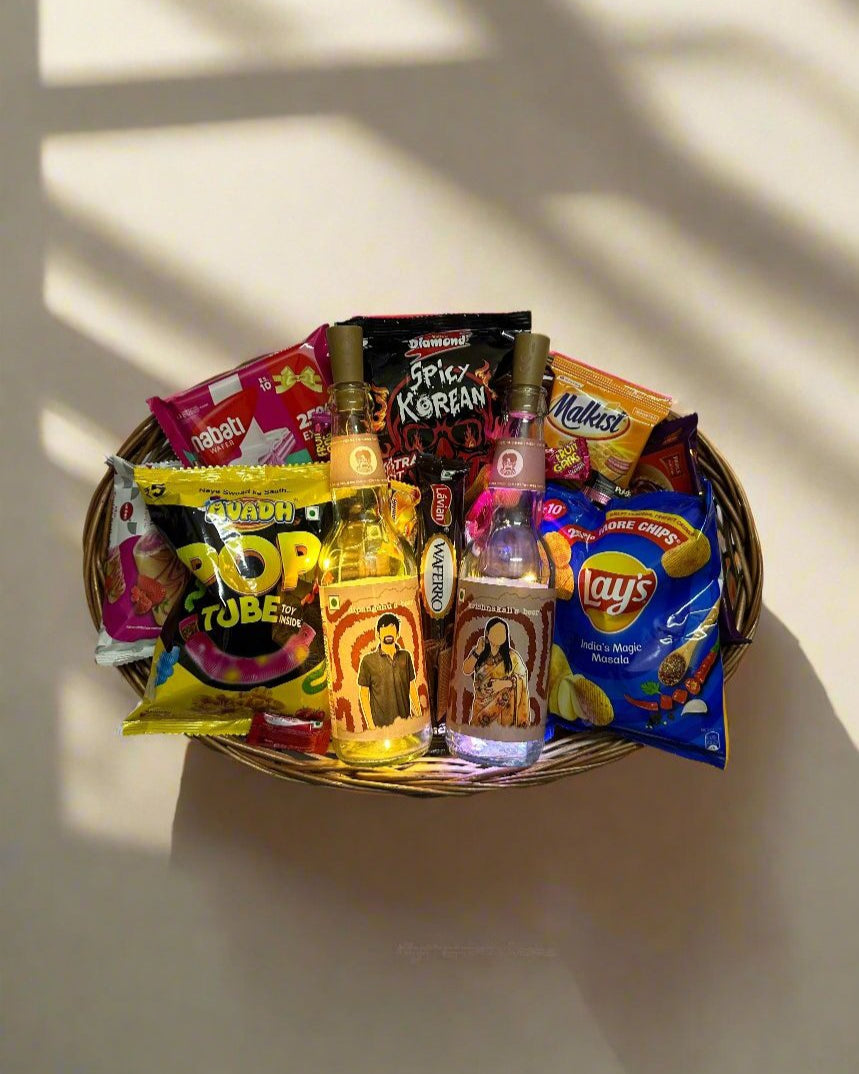 Wedding Trousseau - DopaMean featuring two personalised DopaMean bottles with custom illustrations, inside jokes, and LED lights, complemented by a handcrafted cane basket filled with snacks
