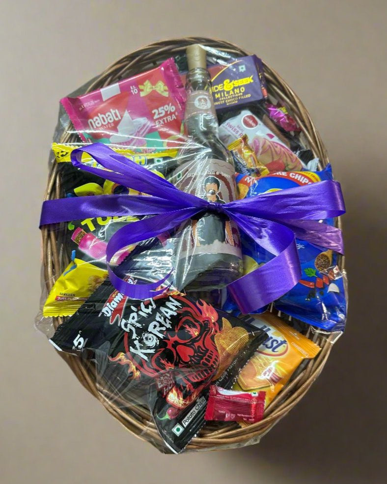 Handcrafted cane basket, elegantly designed to hold a DopaMean bottle and assorted snacks, offering a rustic and reusable packaging option