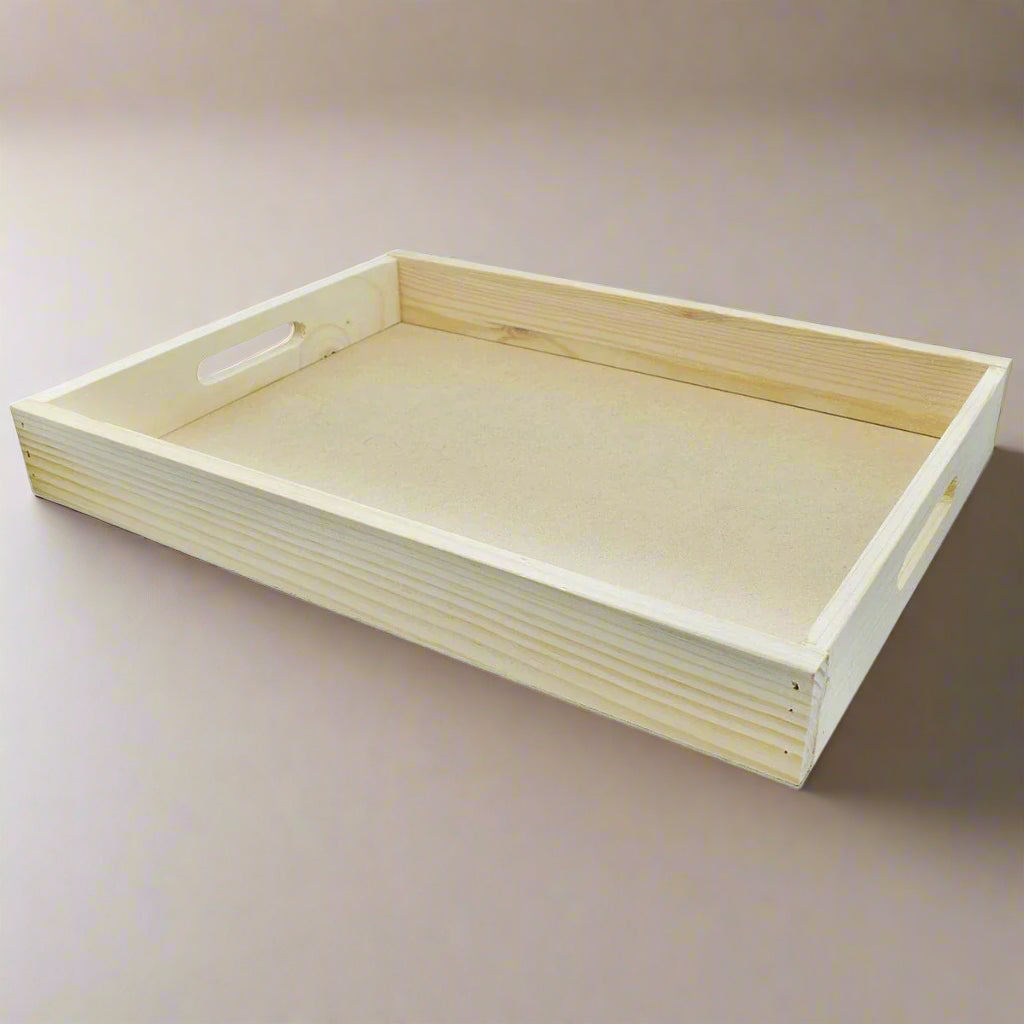 An unoccupied Pine Wood tray on a plain background.